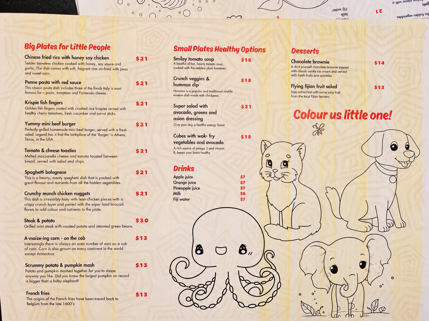 Children’s menu photographed during the stay, with meal, healthy option, drink and dessert sections; shadow lightened for readability