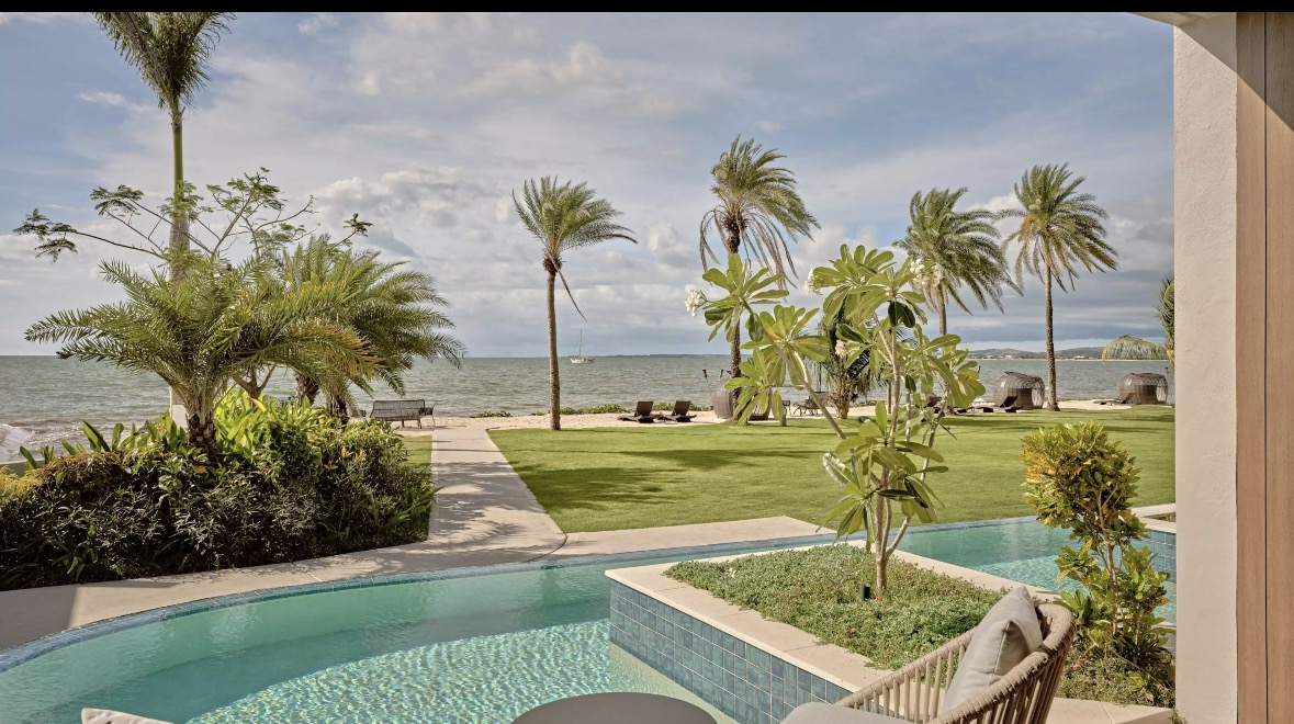 A beachfront pool-access outlook shown by the hotel