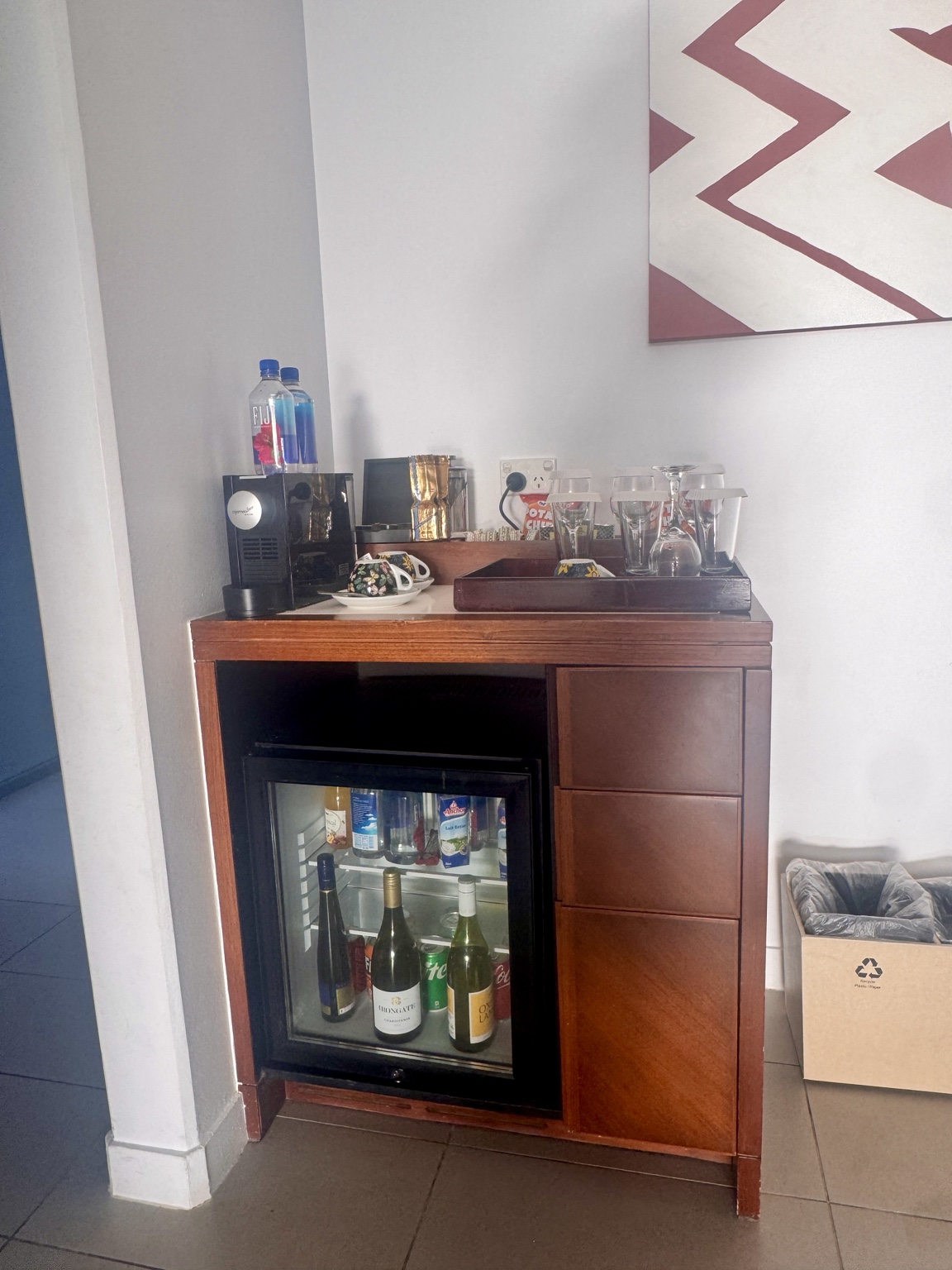 The minibar and coffee station. Complimentary items are described in the review; not every item pictured is necessarily included.