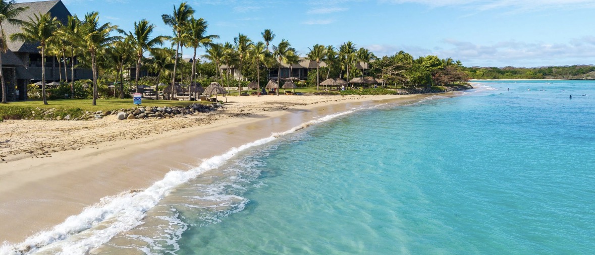 Sand and turquoise water along the resort beachfront